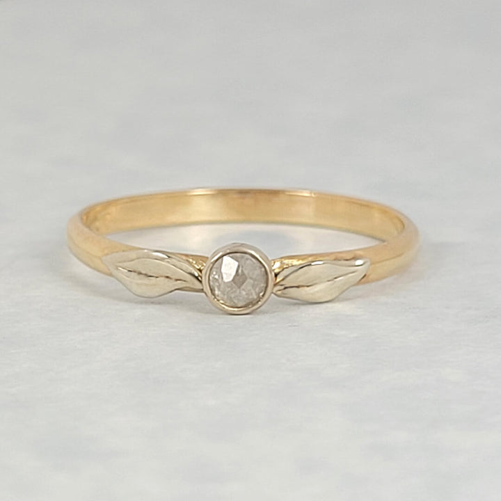 rose cut diamond leaf ring with 14kt yellow gold band and 14kt white gold leaves