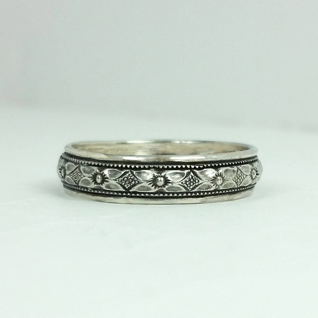 Women's Edwardian style floral wedding band in sterling silver