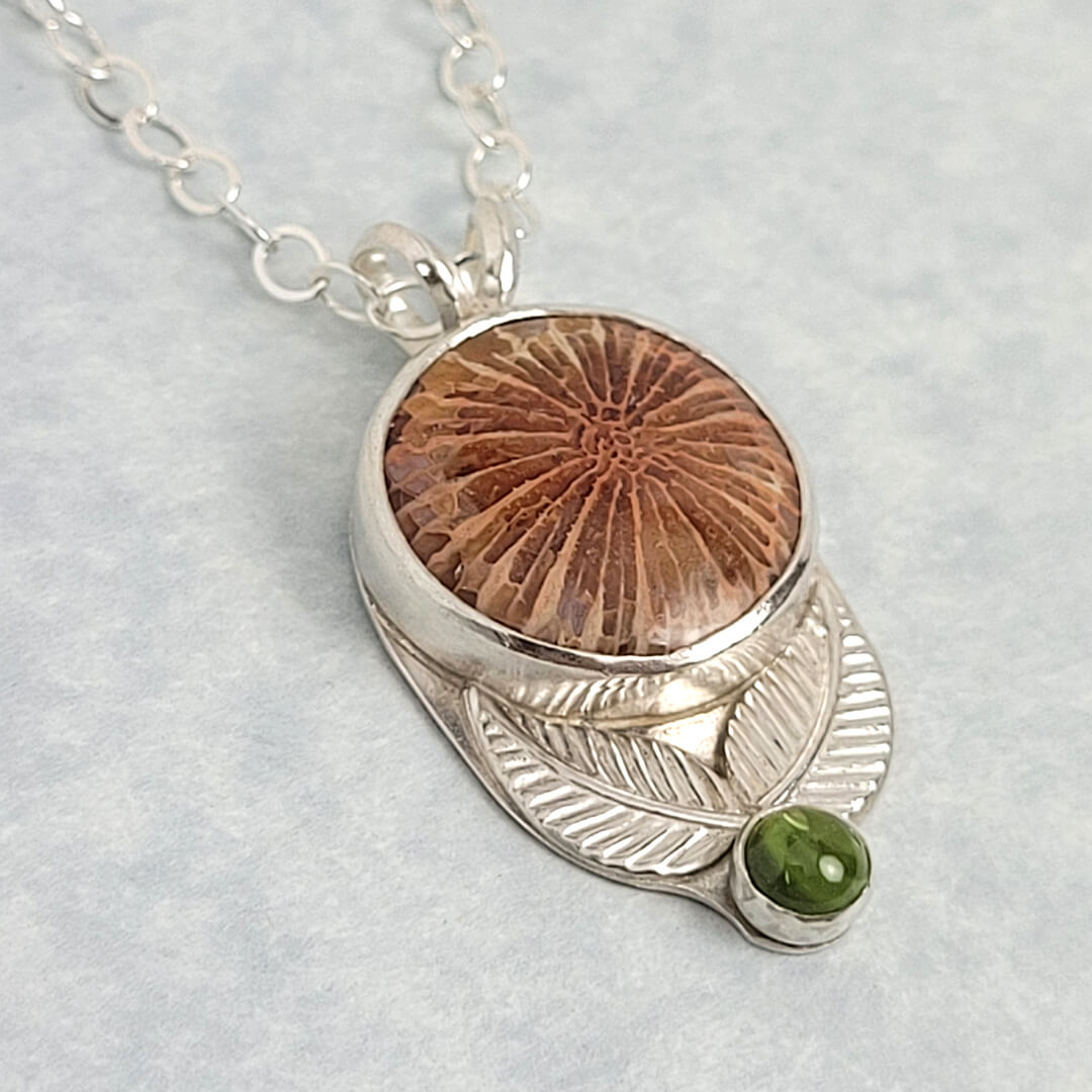 Fossil coral agate flower necklace in sterling silver with peridot