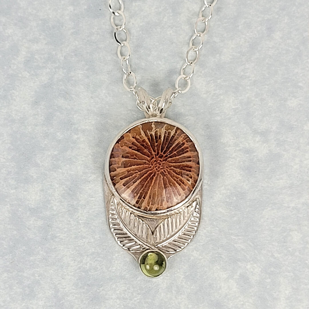 Fossil coral agate flower necklace in sterling silver with peridot