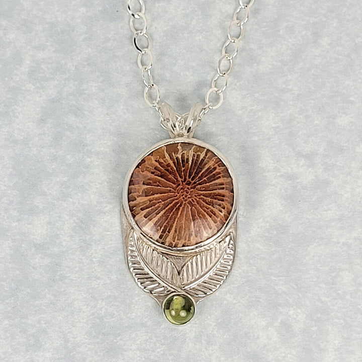 Fossil coral agate flower necklace in sterling silver with peridot