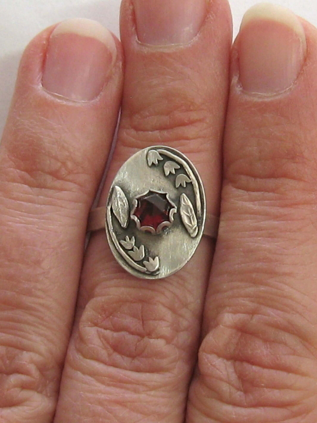 lily of the valley ring with rose cut garnet