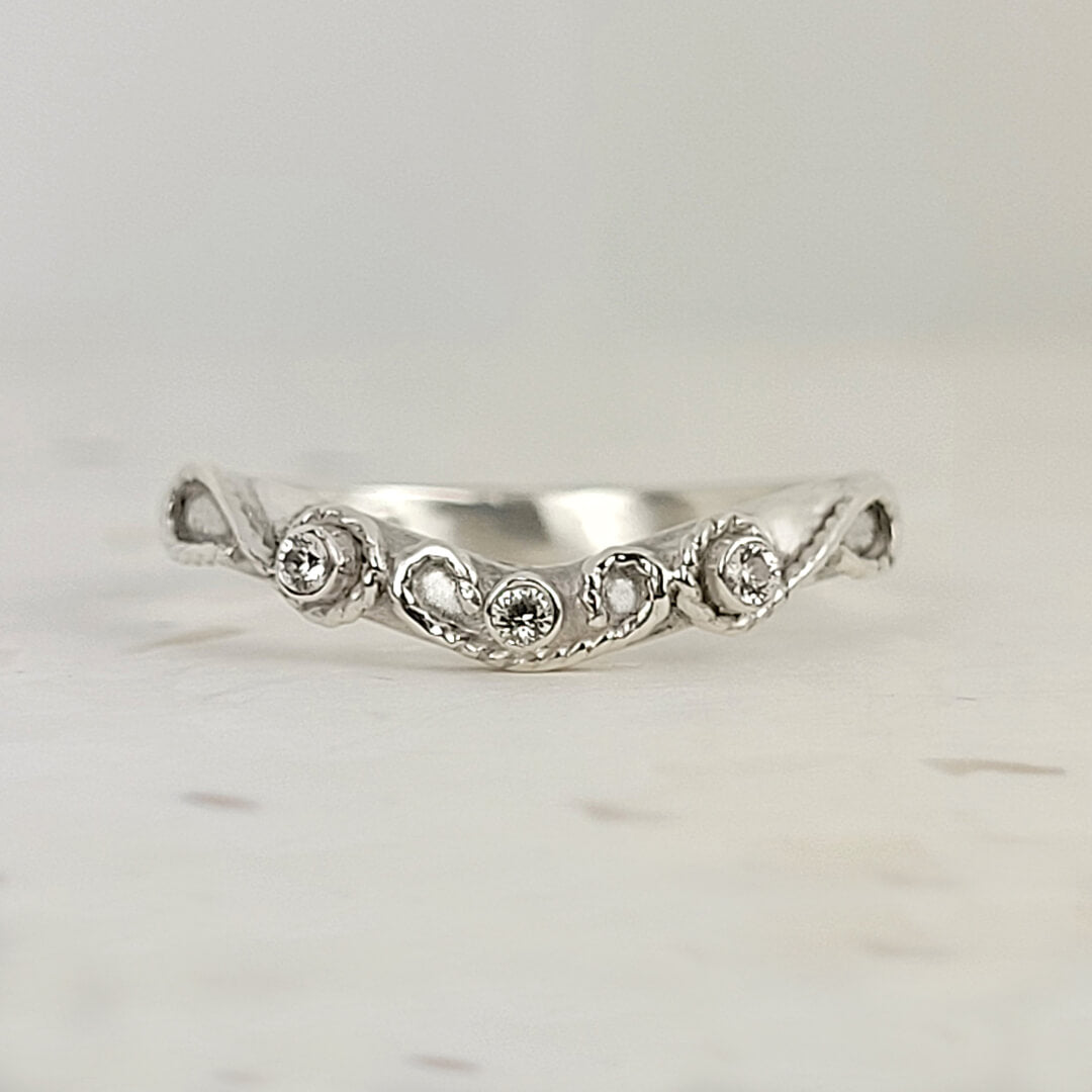 Scrollwork White Sapphire Curved Wedding Band in Sterling Silver