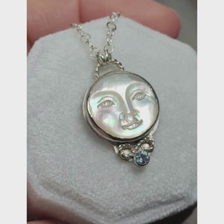 mother of pearl moon face necklace with aquamarine in sterling silver