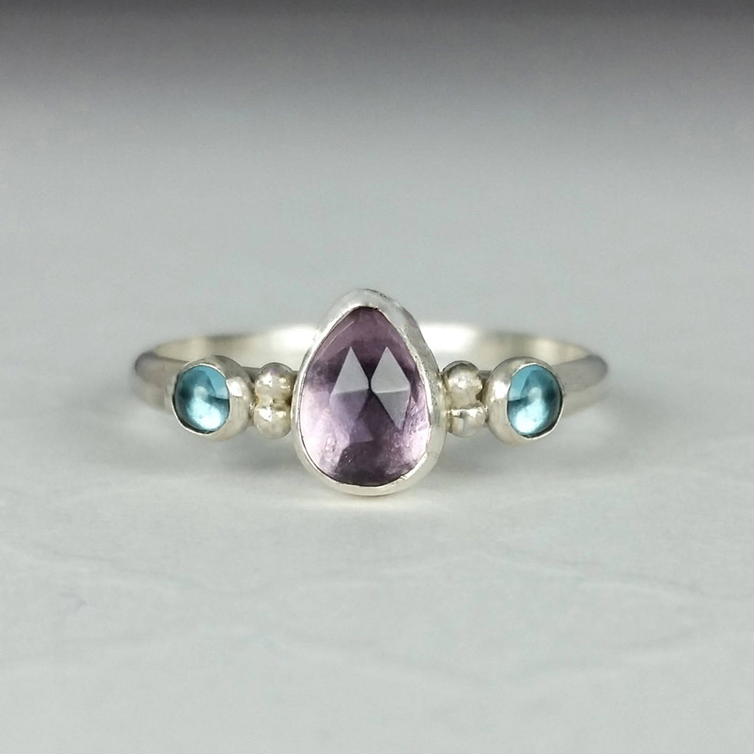 Pear-shaped amethyst and blue topaz ring in sterling silver