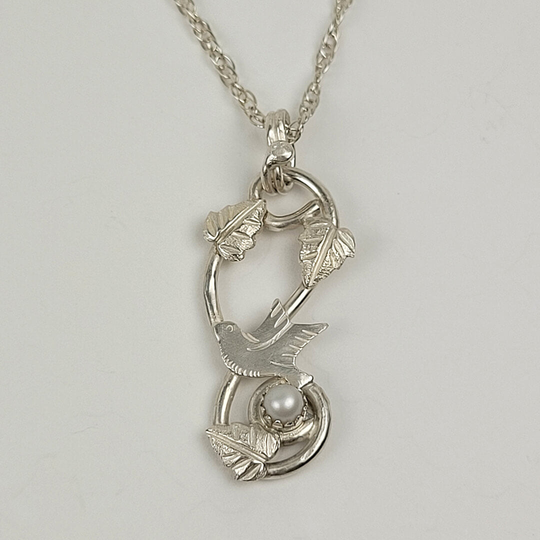 dove bird necklace with pearl in sterling silver