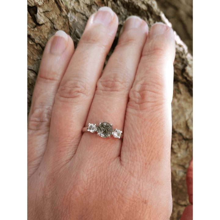 Black rutilated quartz ring with white topaz