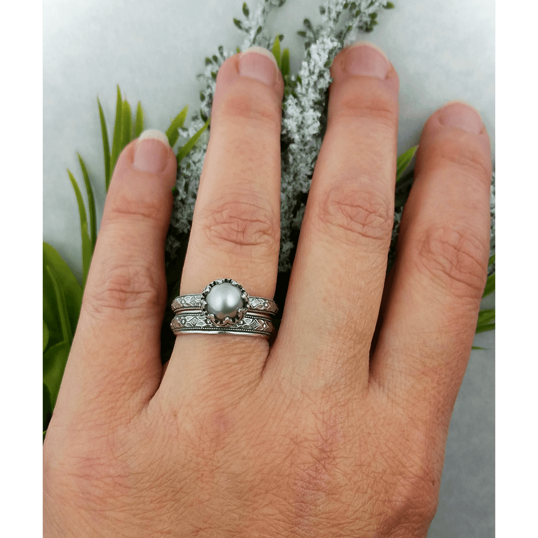 Edwardian inspired gray pearl engagement ring with matching women's wedding band