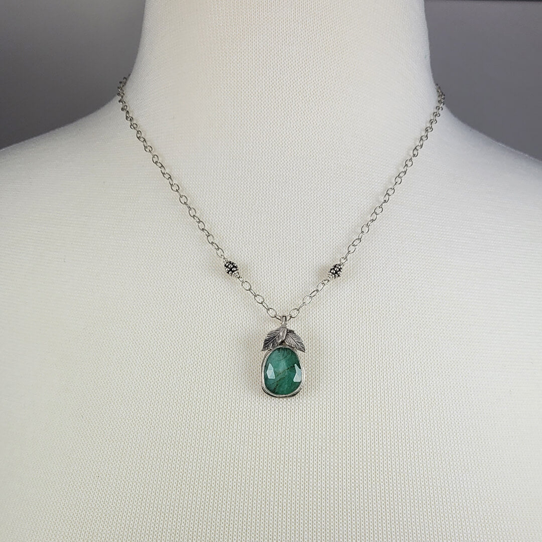 raw emerald necklace with leaves in sterling silver