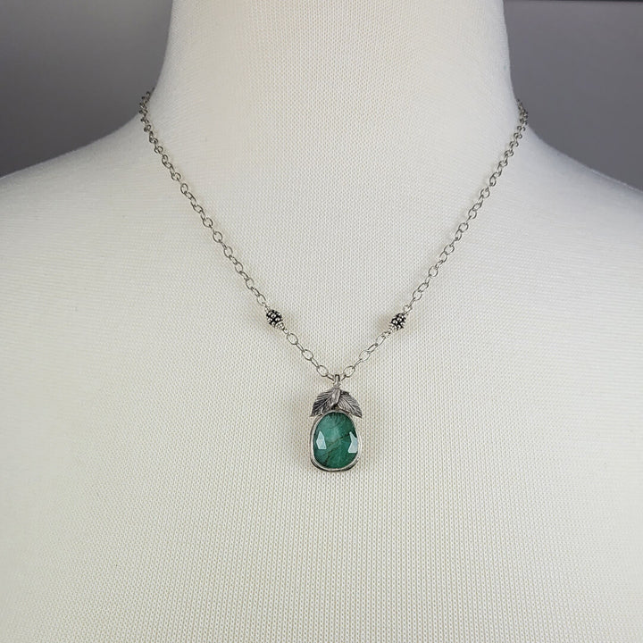 raw emerald necklace with leaves in sterling silver