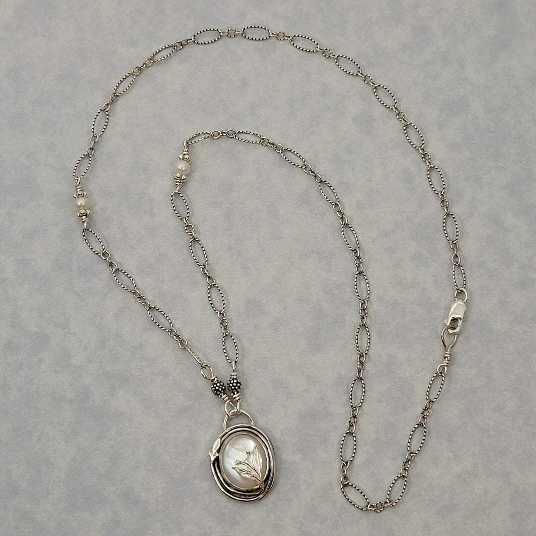 nature-inspired mother of pearl necklace with leaves in sterling silver