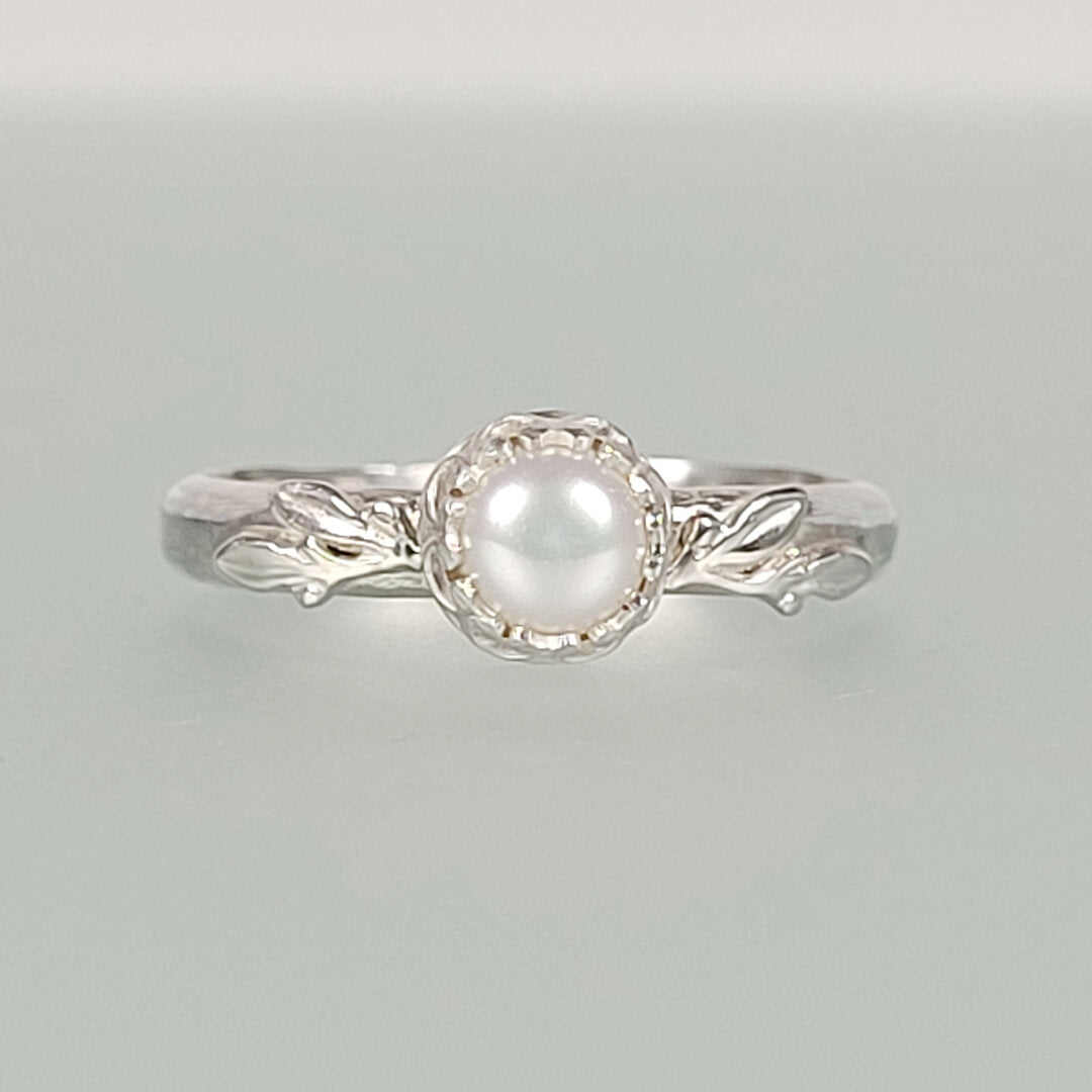 Pearl engagement ring with leaves in sterling silver