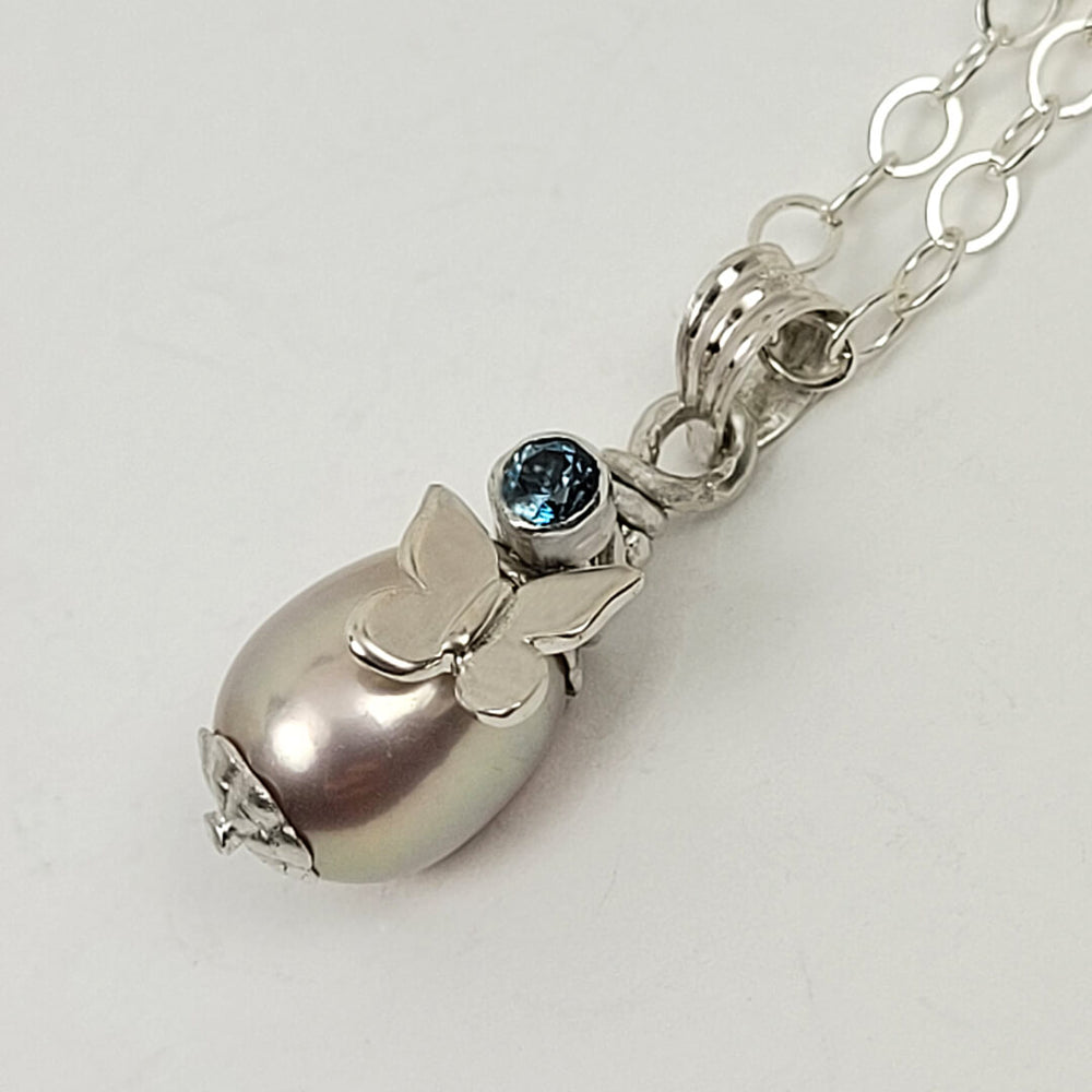 butterfly pearl necklace with London blue topaz in sterling silver