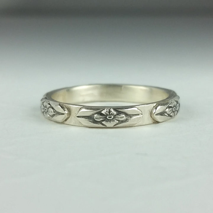 woman's floral wedding ring  in sterling silver