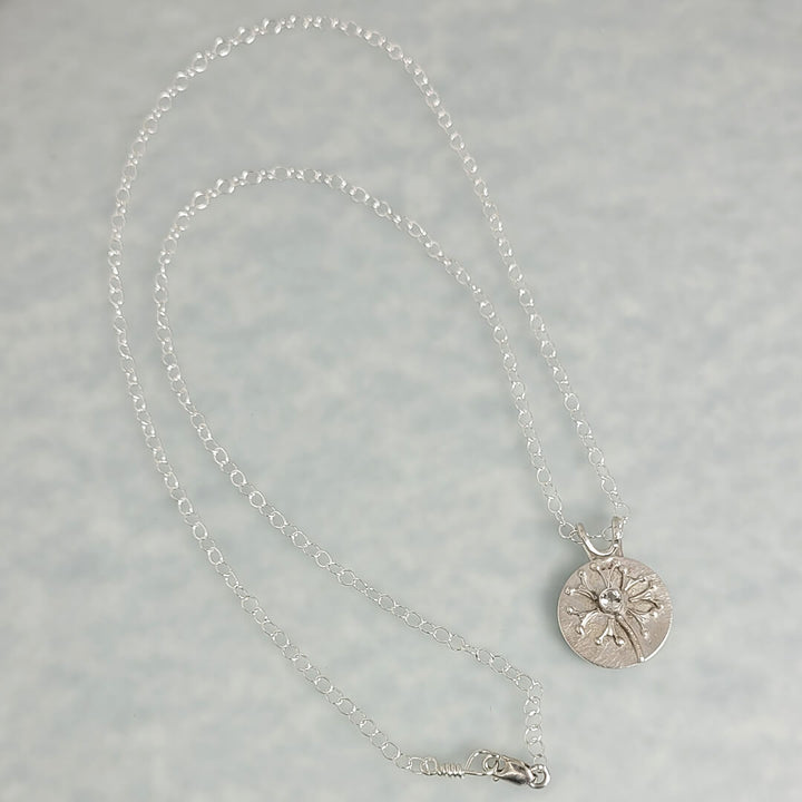 Wish dandelion necklace in sterling silver with white topaz