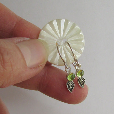 Use a button to keep a pair of earrings together
