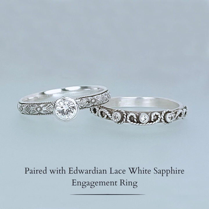 Edwardian-inspired vintage style white sapphire engagement ring and scrollwork white sapphire wedding band set in sterling silver