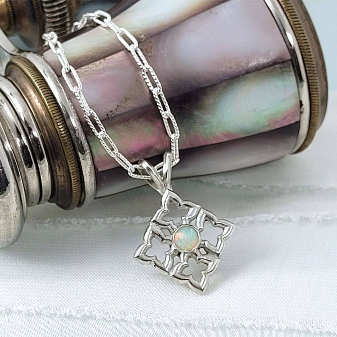 Sterling silver quatrefoil necklace set with opal 