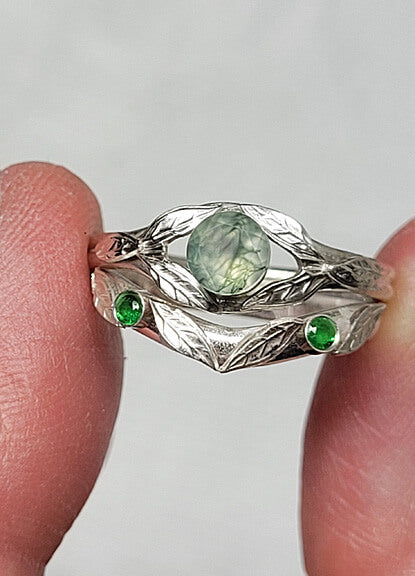 Custom moss agate engagement ring and leaf curved wedding band with tsavorite garnet in sterling silver