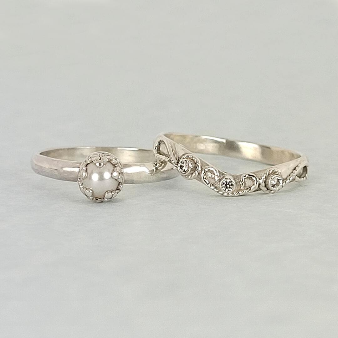 Sterling silver pearl engagement ring and vintage style white sapphire curved wedding band set