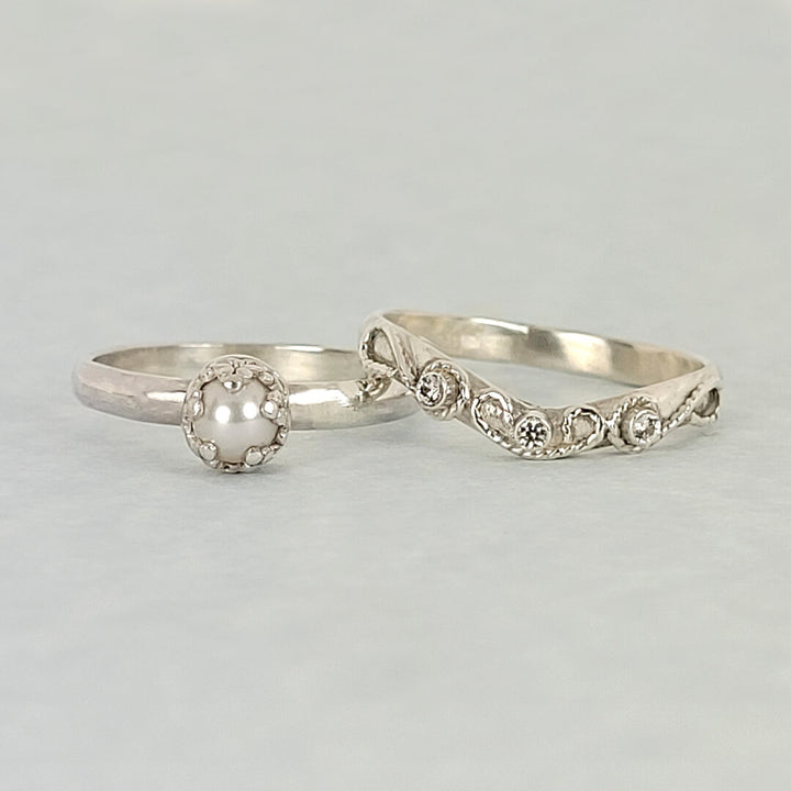 Sterling silver pearl engagement ring and vintage style white sapphire curved wedding band set