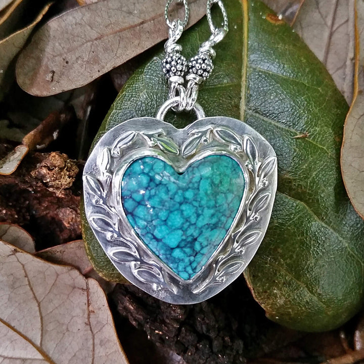 Nature-inspired Turquoise Heart Necklace with Leaves and vines in Sterling Silver