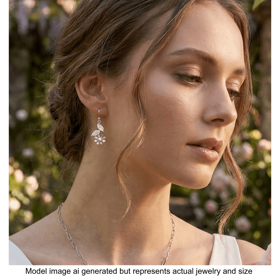 white wild flower earrings in sterling silver dangling from model&