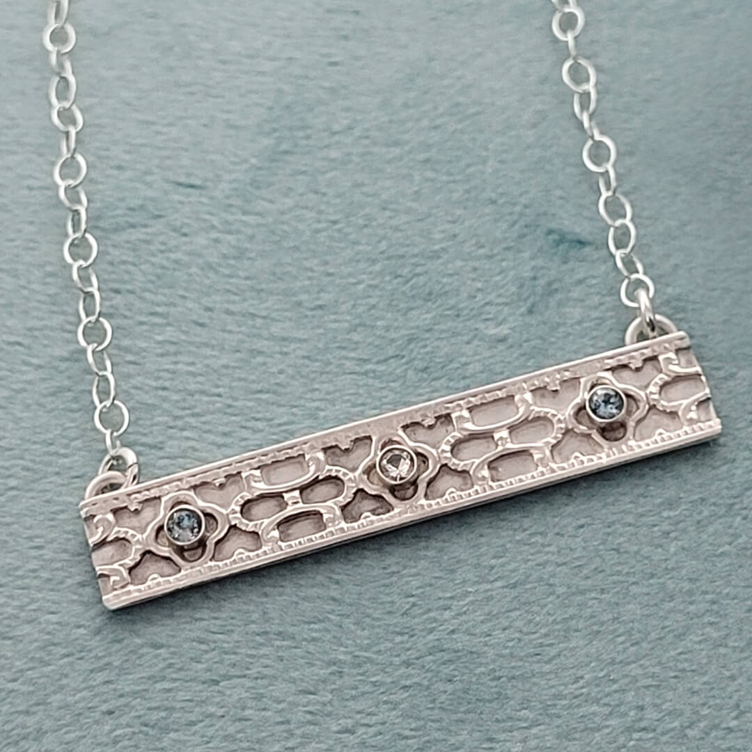 Art Deco-inspired Sterling Silver Bar Necklace with White Sapphire and Blue Topaz
