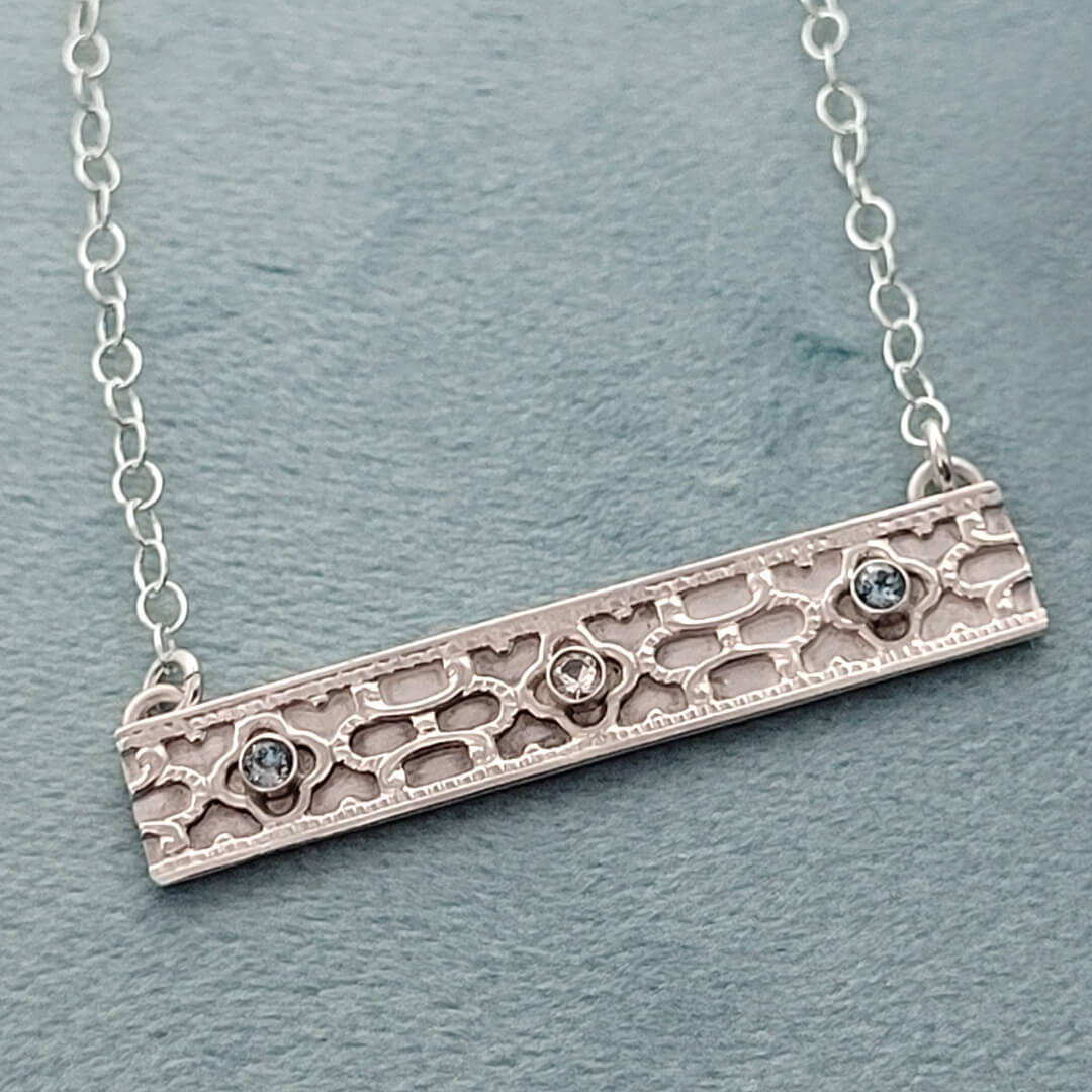 Art Deco-inspired Sterling Silver Bar Necklace with White Sapphire and Blue Topaz