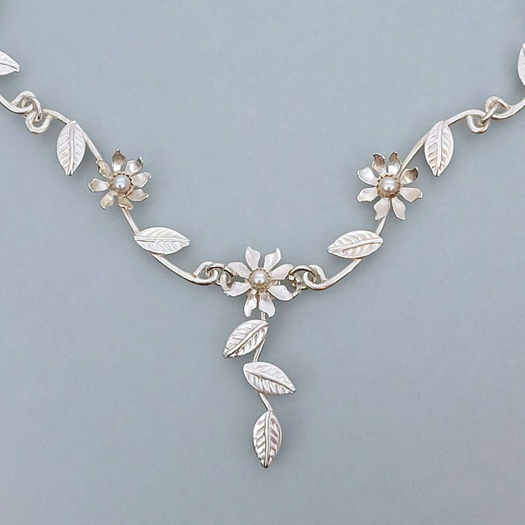 close-up of Flower Vine Necklace in Sterling Silver with Pearls