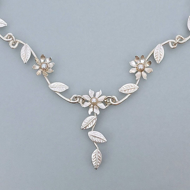 close-up of Flower Vine Necklace in Sterling Silver with Pearls