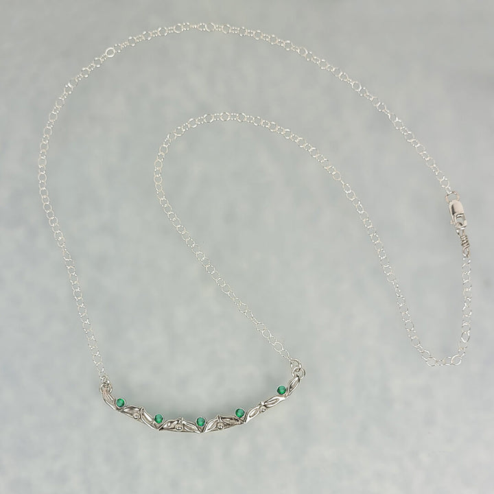 Curved Bar Vine and Leaf Necklace with Emerald in Sterling Silver