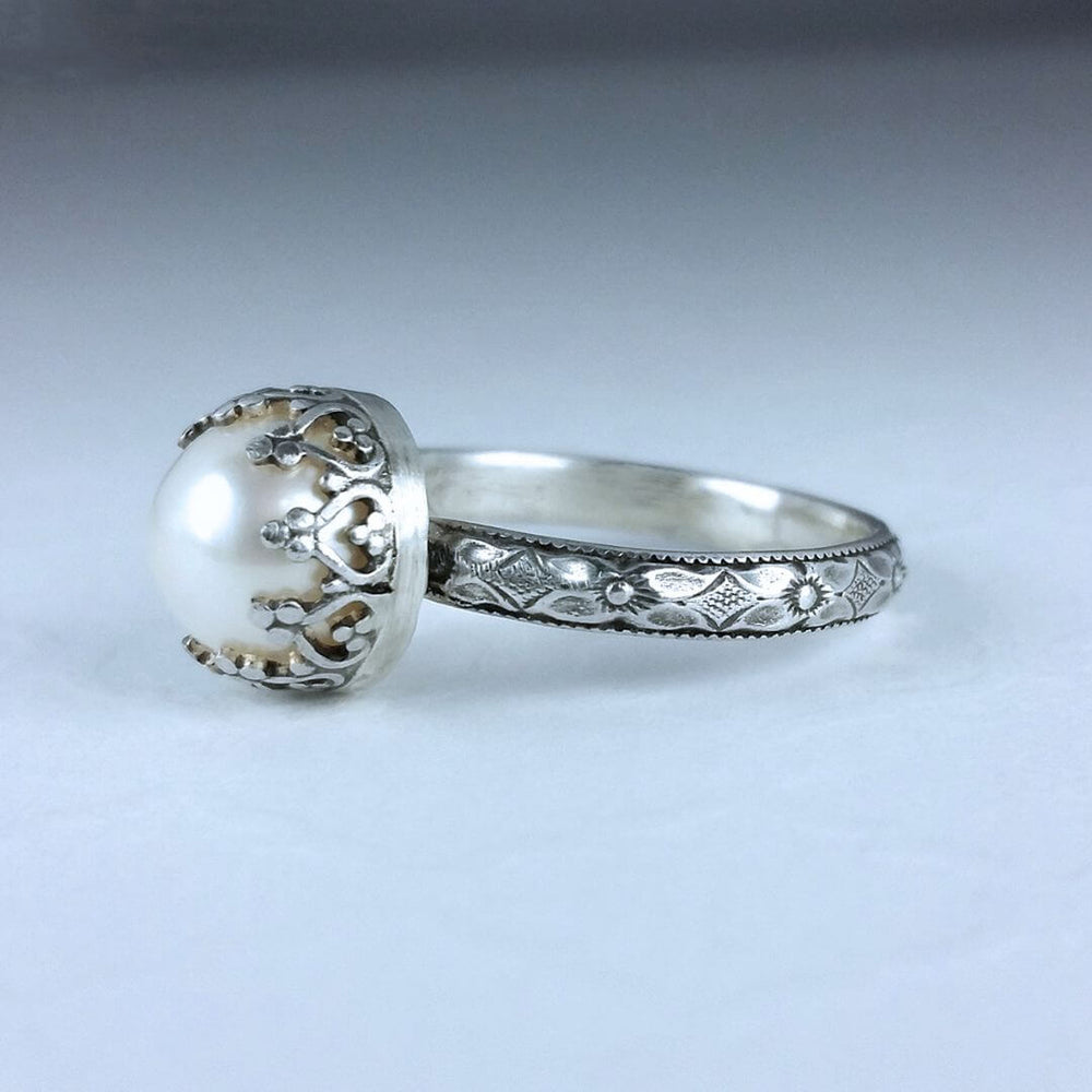 Edwardian inspired vintage style pearl engagement ring in sterling silver with textured floral band and heart crown setting