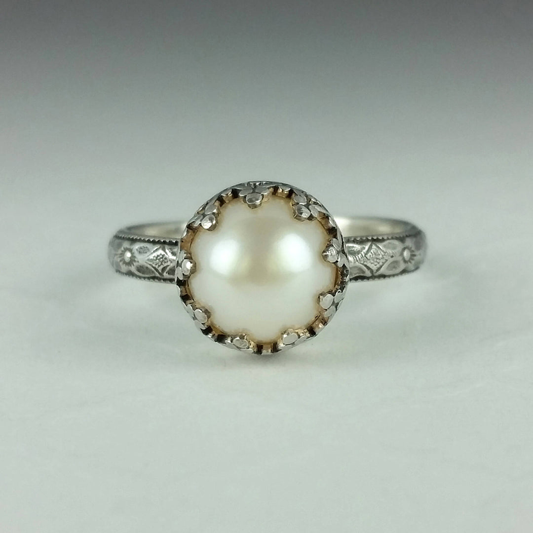 Edwardian vintage style pearl engagement ring with floral band