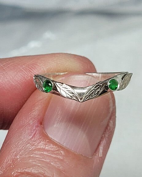 Custom leaf curved wedding band with tsavorite garnet in sterling silver front