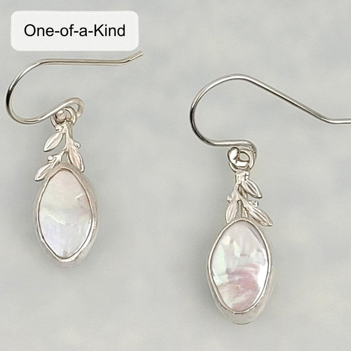 Marquise-shaped pearl drop earrings with leaves in sterling silver