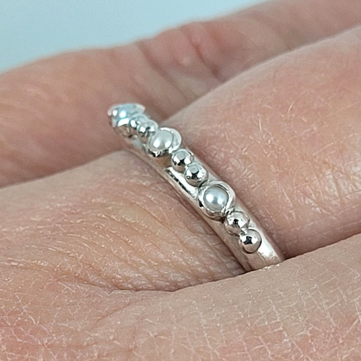 Sterling silver pearl band ring details