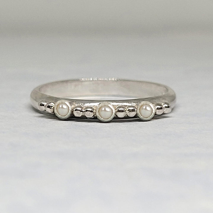 Pearl band ring in sterling silver