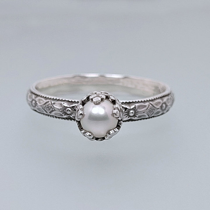 Edwardian vintage-inspired petite pearl engagement ring in sterling silver