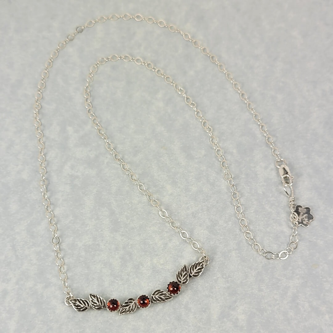 Rose Bud Garnet Necklace in Sterling Silver