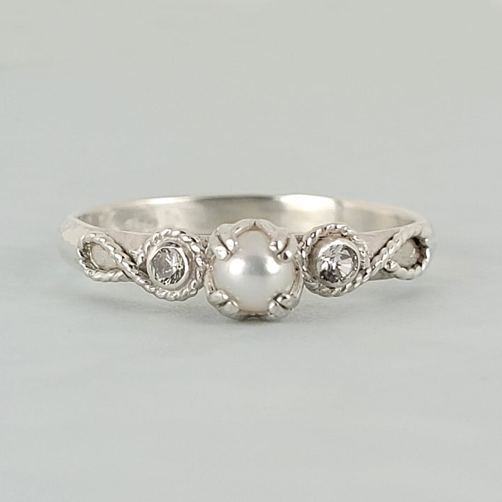 Scrollwork White Sapphire and Pearl Engagement Ring in Sterling Silver