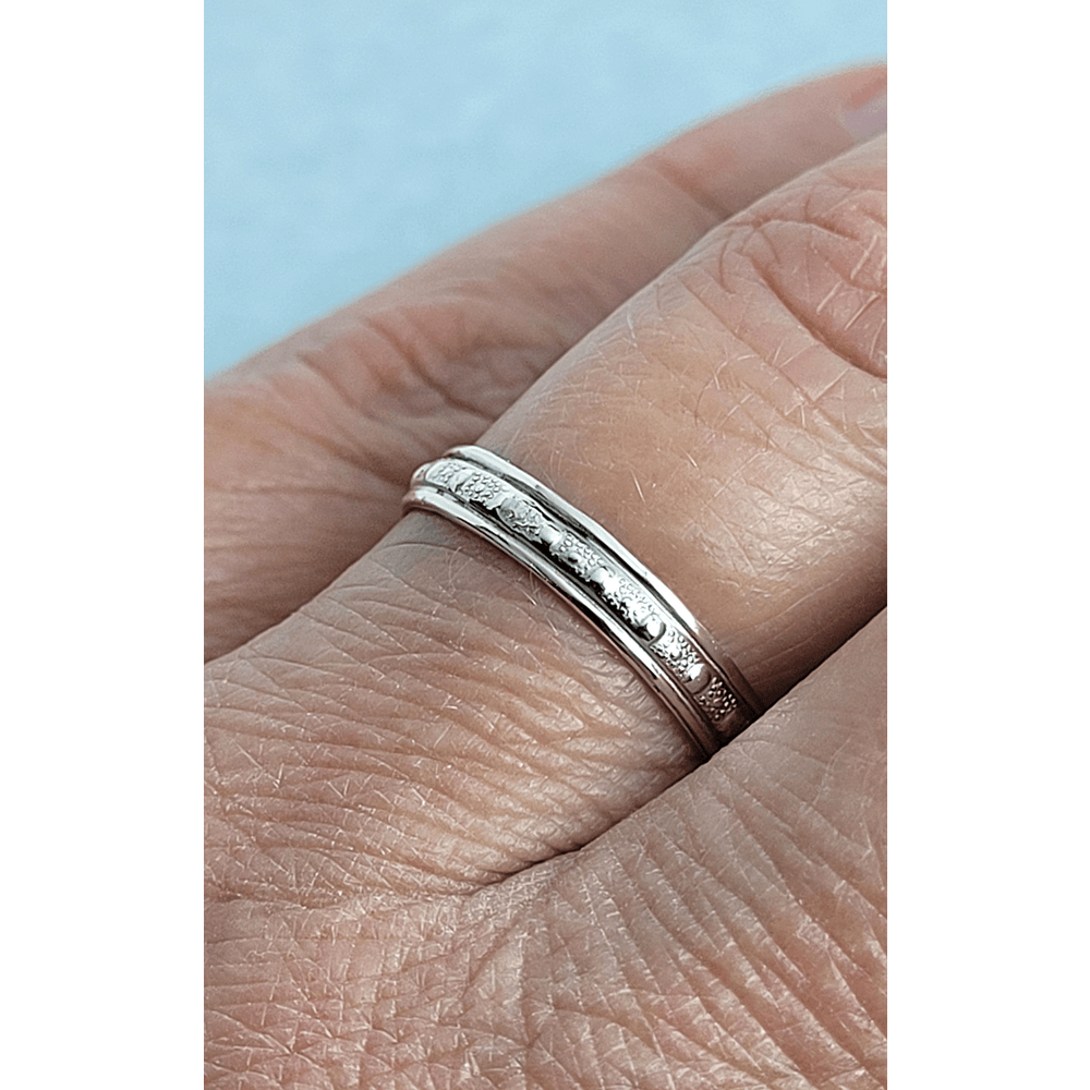 Women's slim sterling silver wedding band with vintage-inspired dot-texture