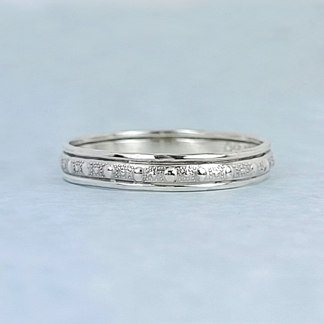 Women's slim sterling silver wedding band with vintage-inspired dot-texture