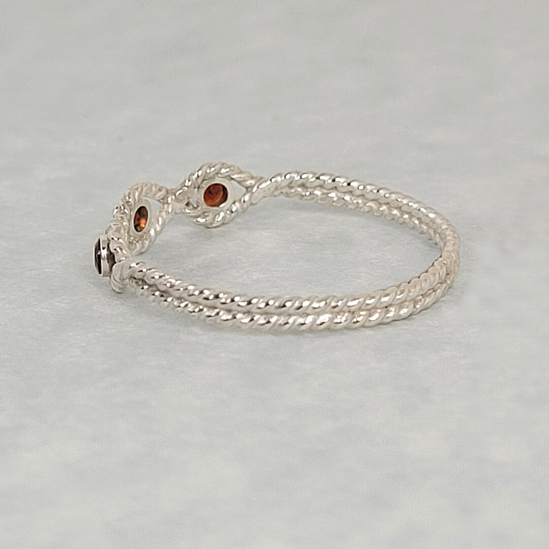 Sterling Silver Braided Ring with Garnet Backside