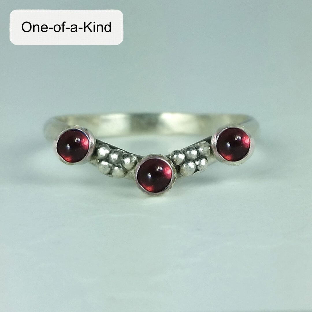 Three stone curved band Ring with Garnets