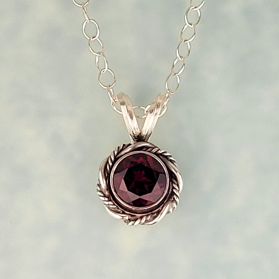 Vintage style garnet pendant necklace in sterling silver