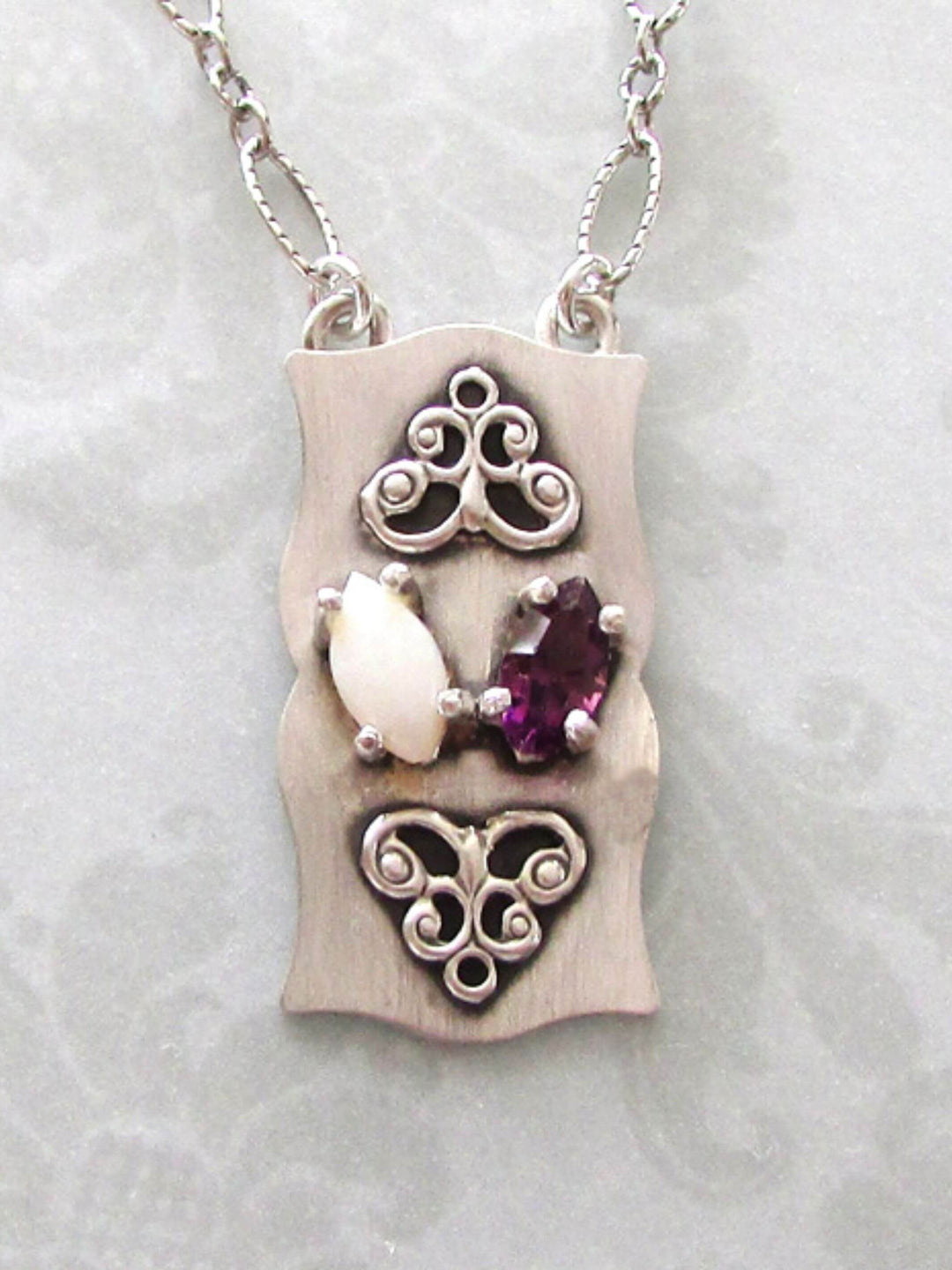 vintage style pendant with opal and amethyst