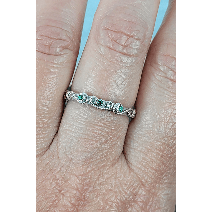 vintage-inspired scrollwork ring with emeralds in sterling silver