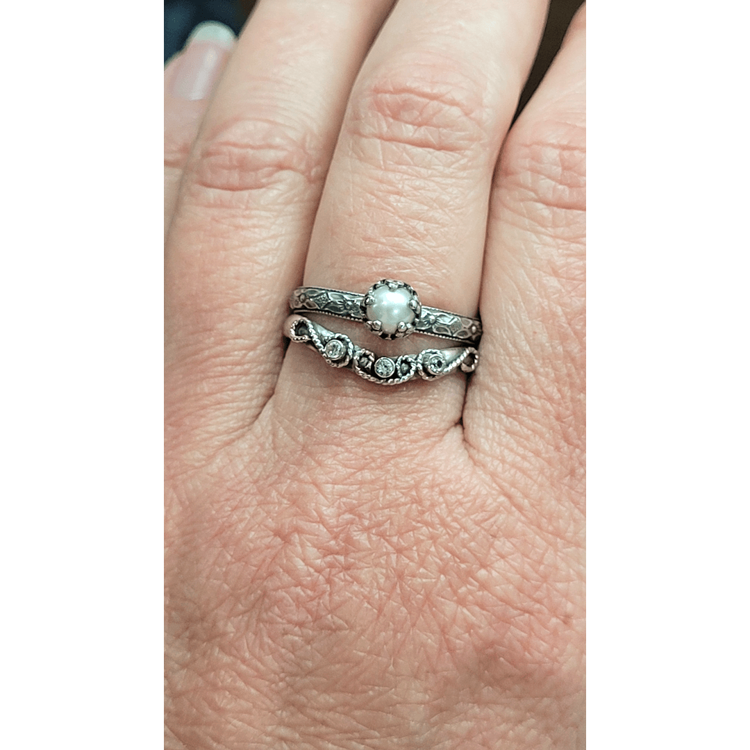 vintage style pearl engagement ring and scrollwork curved wedding band with white sapphires set in sterling silver
