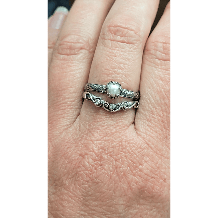 vintage style pearl engagement ring and scrollwork curved wedding band with white sapphires set in sterling silver